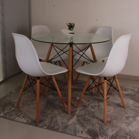 COMEDOR REDONDO TAPA VIDRIO MÁS 4 SILLAS DKR TIPO EAMES BLANCAS