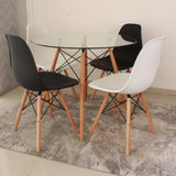 COMEDOR REDONDO TAPA VIDRIO MÁS 4 SILLAS DKR TIPO EAMES BLANCAS