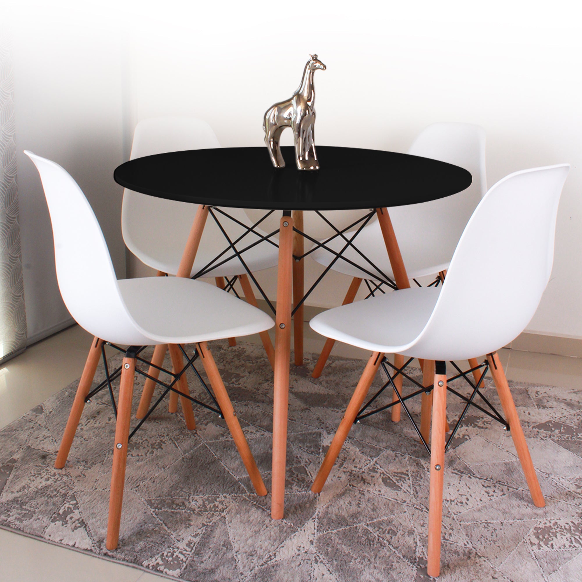COMEDOR 4 PUESTOS RENDONDO NEGRO/EAMES BLANCAS