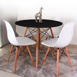 COMEDOR REDONDO TAPA NEGRA MÁS 4 SILLAS DKR TIPO EAMES BLANCAS